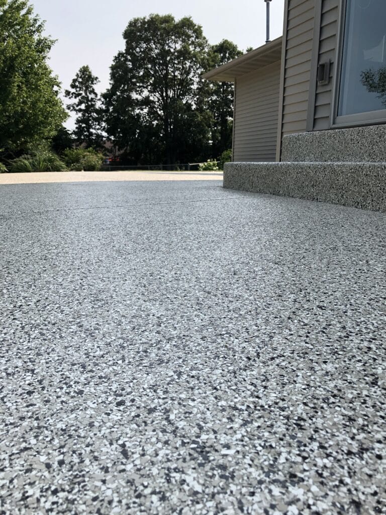 River Rock patio concrete coatings in an outdoor space.